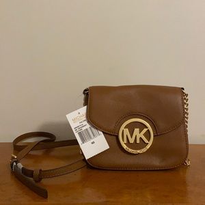 MICHAEL KORS cross body purse.